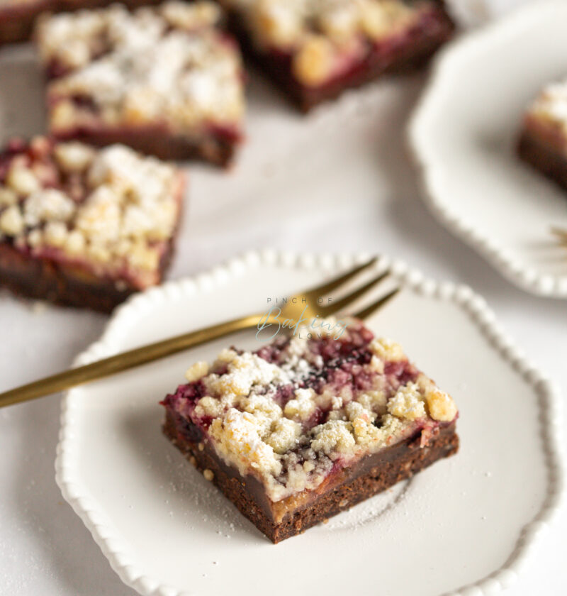 Chocolate Shortcrust, pastry cream, plums & crumble